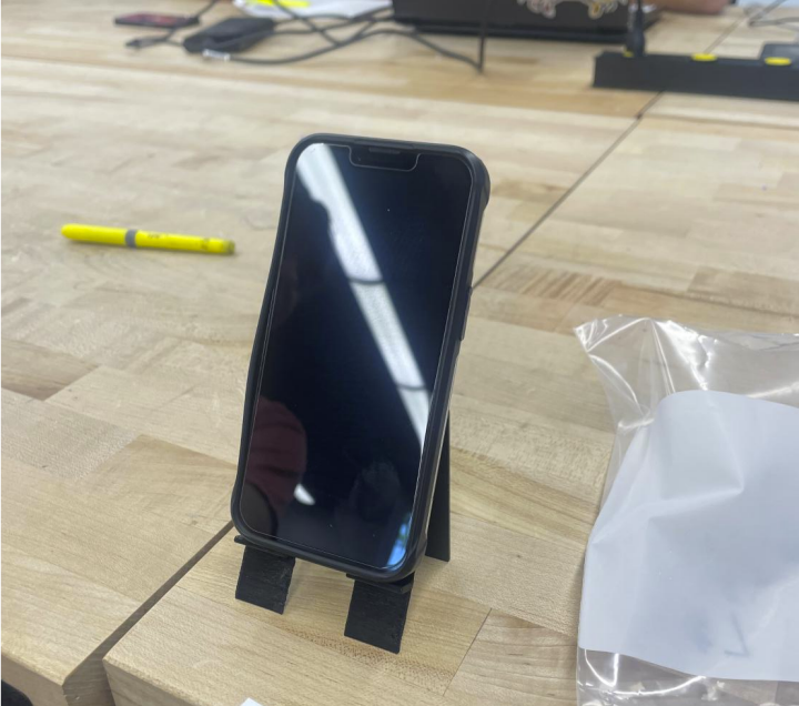 Physical 3D Printed Phone Stand in Portrait Orientation with iPhone 14 Pro